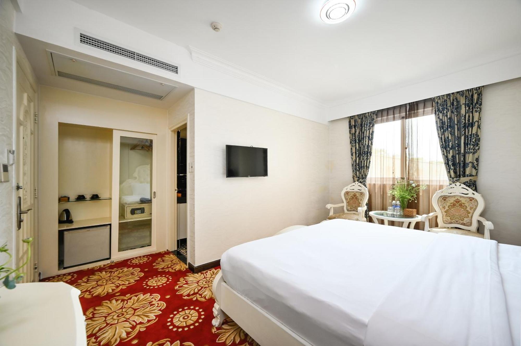California Saigon Hotel & Rooftop Pool Cidade de Ho Chi Minh Quarto foto