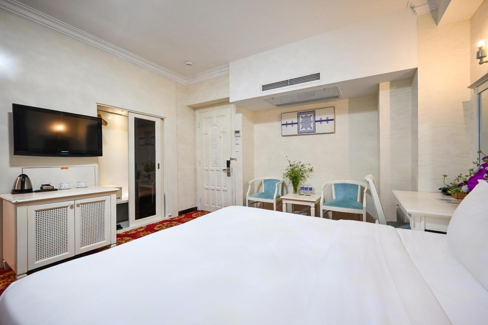 California Saigon Hotel & Rooftop Pool Cidade de Ho Chi Minh Quarto foto