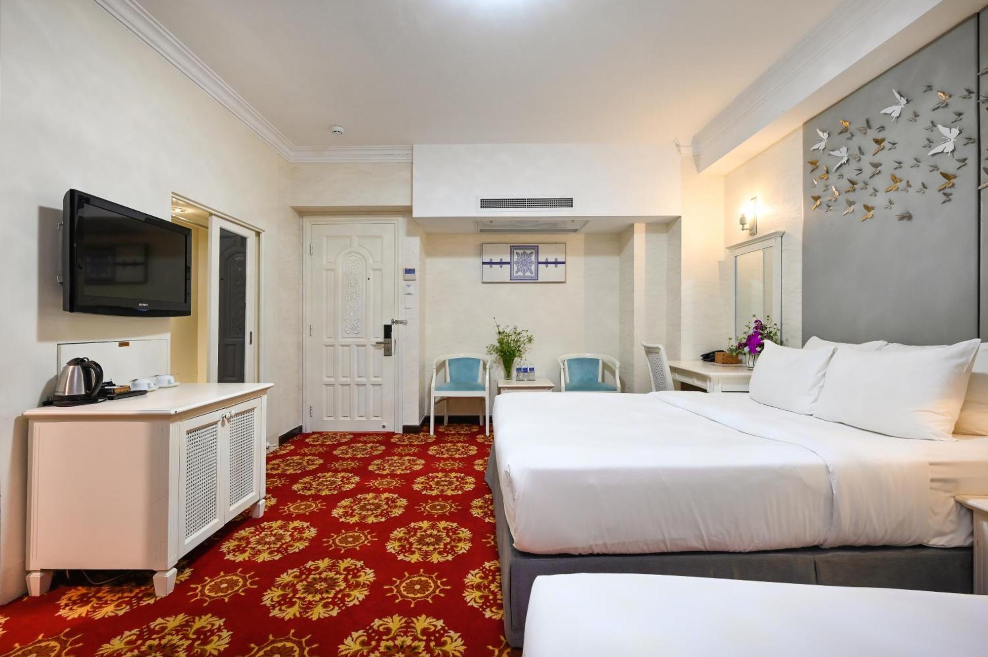 California Saigon Hotel & Rooftop Pool Cidade de Ho Chi Minh Quarto foto