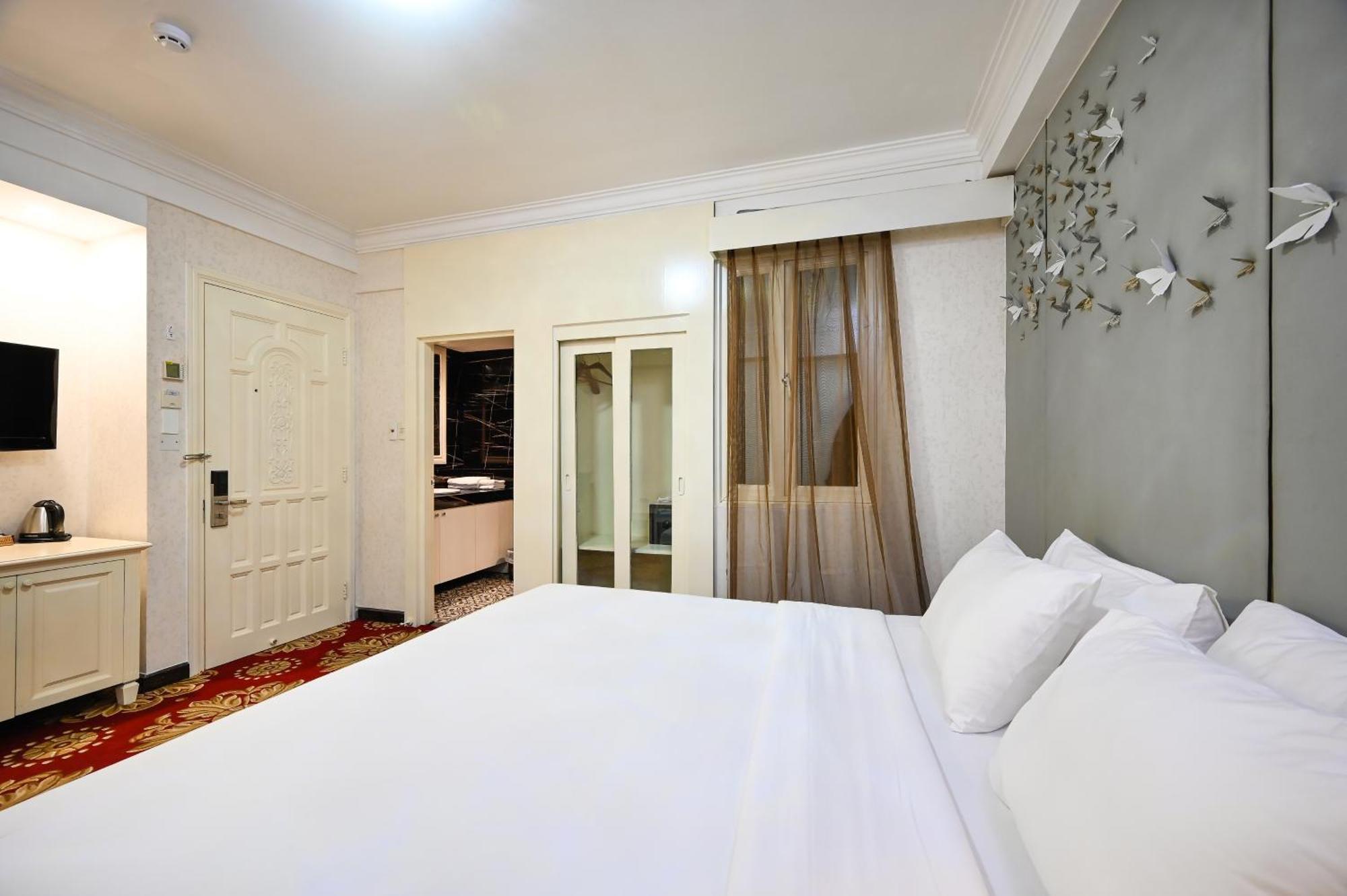 California Saigon Hotel & Rooftop Pool Cidade de Ho Chi Minh Quarto foto